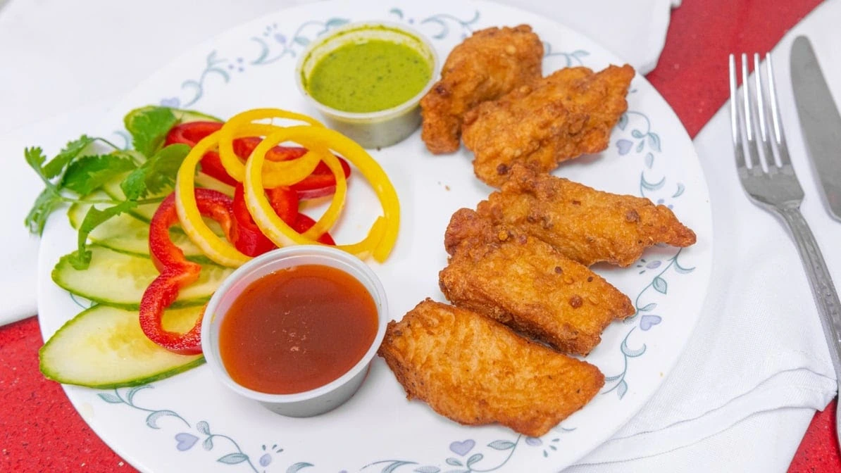 Butter Chicken - Signature dish at Dil-e-Punjab, Edmonton